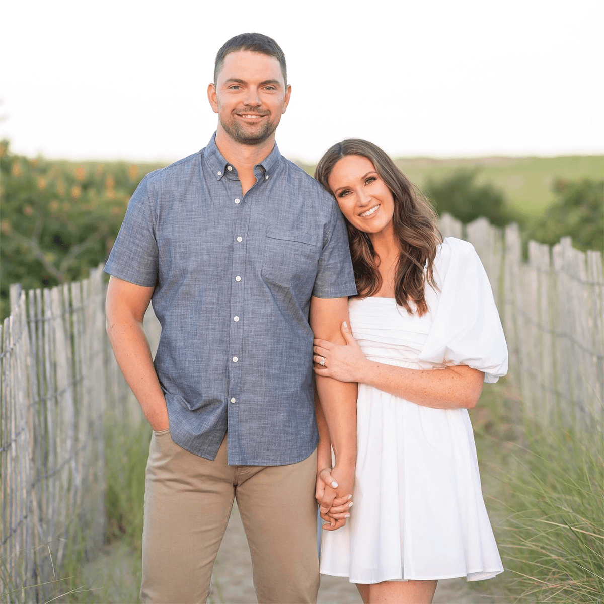 Alison & Dustin Showing Diamond Engagement Ring in Plum Island, Massachusetts