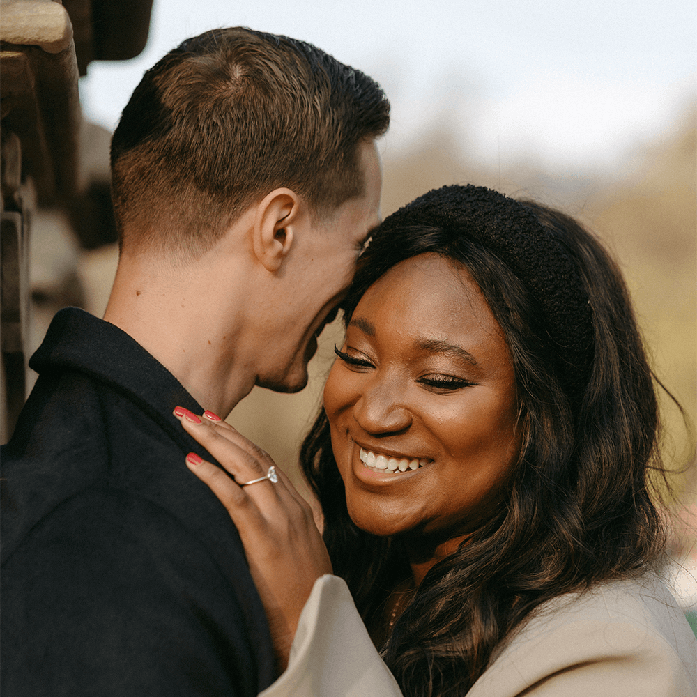 Ehi & Brandon Showing Diamond Engagement Ring in New York City, New York