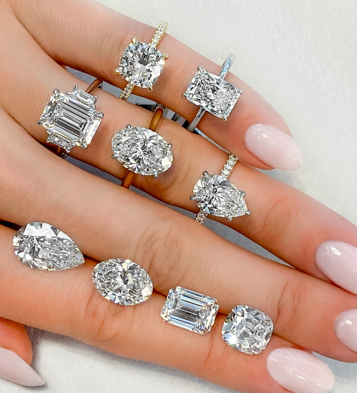 five various style diamond shape engagement rings